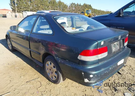 1999 Honda Civic Dx z USA, uszkodzony, nr VIN 1HGEJ6226XL011096